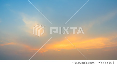 Vibrant evening sky with clouds background Vibrant evening sky with clouds background 65753501
