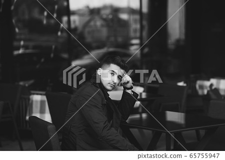 gentleman sitting in city cafe gentleman sitting in city cafe 65755947