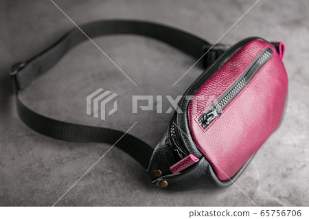 Waist bag made of dark red leather, banana on a Waist bag made of dark red leather, banana on a 65756706