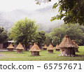 Mountain morning misty landscape with an apiary 65757671