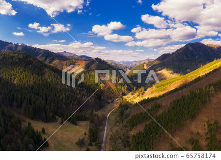 Aerial view of a valley in the Greater Fatra mountains in Slovakia Aerial view of a valley in the Greater Fatra mountains in Slovakia 65758174