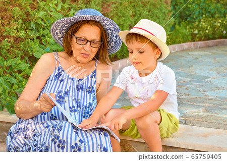 Boy studying with tutor. Home schooling concept. 65759405