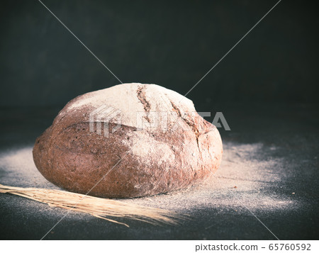 Whole homemade sourdough rye bread, copyspace Whole homemade sourdough rye bread, copyspace 65760592