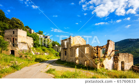 Ruined buildings of an abandoned city. Ruined buildings of an abandoned city. 65760633