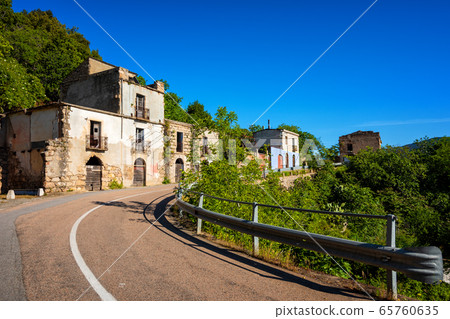 Ruined buildings of an abandoned city. Ruined buildings of an abandoned city. 65760635