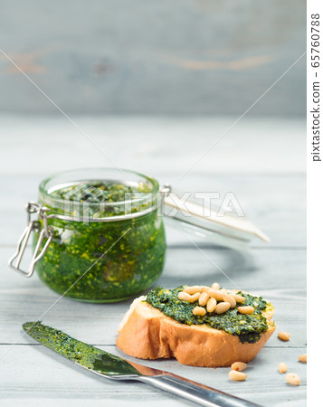 baguette bread with fresh pesto 65760788