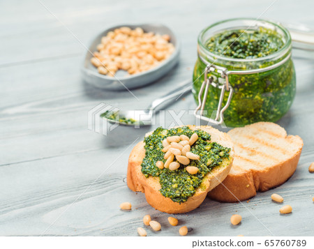 baguette bread with fresh pesto 65760789