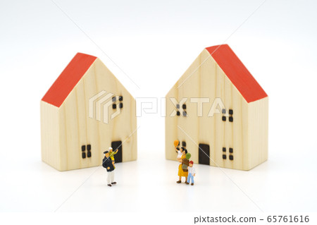 Stay Home. Miniature people stay apart to reduce 65761616