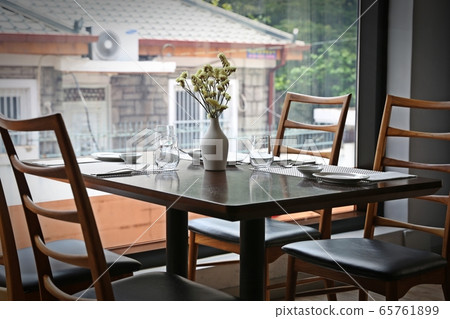 Reserved table waiting for guests 65761899