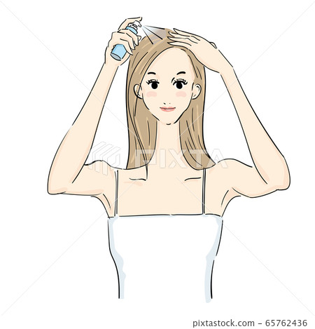 Woman applying hair styling agent Woman applying hair styling agent 65762436