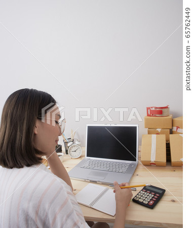 Young woman work from home Young woman work from home 65762449