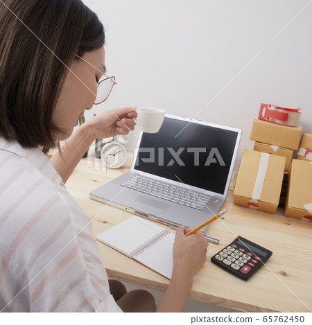 Young woman work from home Young woman work from home 65762450