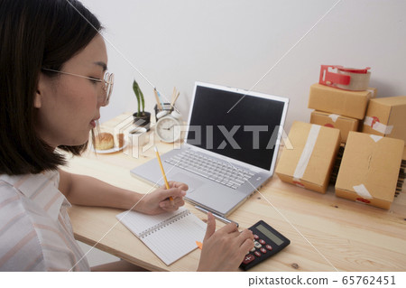 Young woman work from home Young woman work from home 65762451