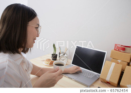 Young woman work from home Young woman work from home 65762454