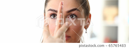 Strong independent beauty woman hold defencs hand portrait Strong independent beauty woman hold defencs hand portrait 65765483