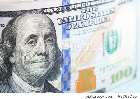 Close up view on hudred dollars bill. Close up view on hudred dollars bill. 65765710
