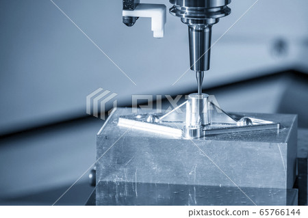 The  CNC  milling machine cutting  the mold parts. 65766144
