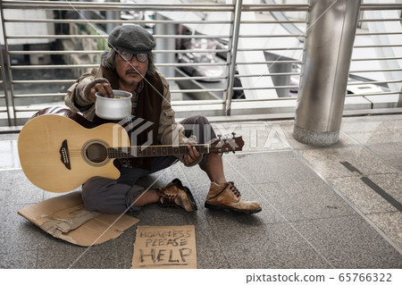 Old beggar ask for money after play guitar Old beggar ask for money after play guitar 65766322