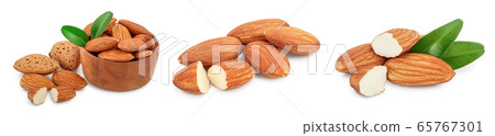 Almonds nuts with leaves isolated on white background with clipping path and full depth of field. Set or collection Almonds nuts with leaves isolated on white background with clipping path and full depth of field. Set or collection 65767301