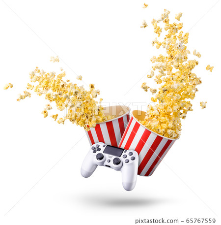 Flying popcorn and video game joystick gamepad 65767559