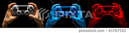 Set of hands holding video game gamepad in neon Set of hands holding video game gamepad in neon 65767583
