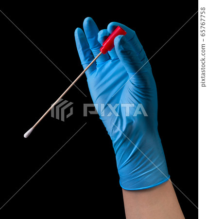 Doctor's hand in medical gloves holding test tube 65767758