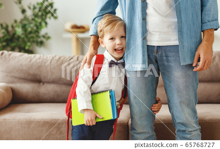 happy laughing child a little boy with a school 65768727