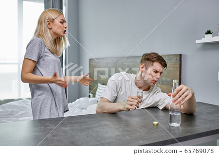 young man tired of hysterical wife young man tired of hysterical wife 65769078