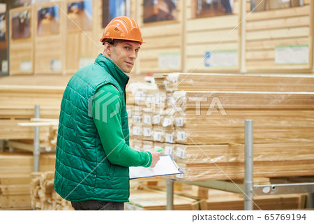 young caucasian warehouse worker at workplace young caucasian warehouse worker at workplace 65769194