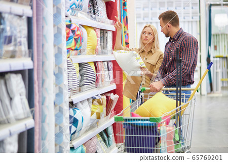 maybe this one couple choosing new pillow for their new house maybe this one couple choosing new pillow for their new house 65769201