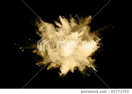 Golden powder explosion on black background. Golden powder explosion on black background. 65771703