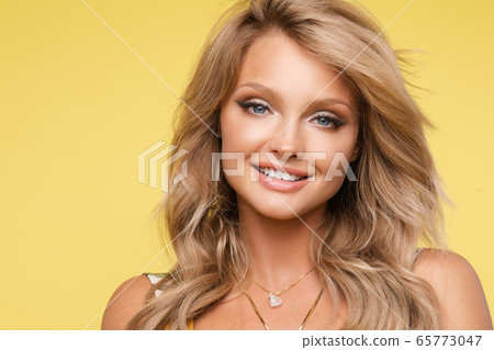 Portrait of adorable young blonde girl smiling Portrait of adorable young blonde girl smiling 65773047