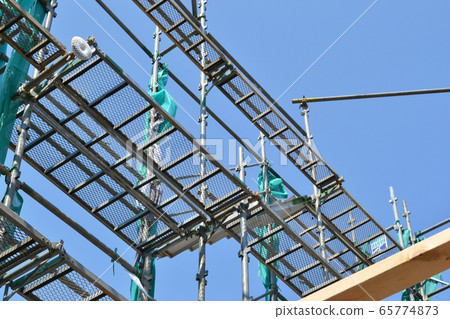 House / building scaffolding on construction site House / building scaffolding on construction site 65774873