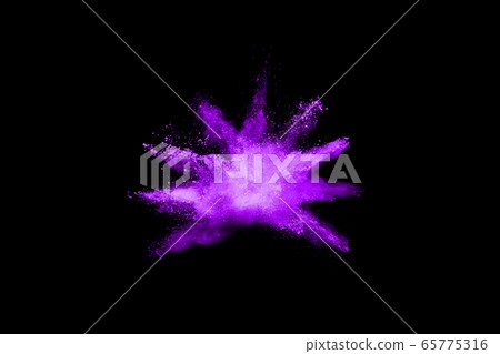The movement of abstract dust explosion frozen purple on black background. Stop the movement of powdered purple on black background. Explosive powder purple on black background. 65775316