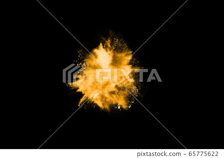 Freeze motion of yellow dust explosion isolated on black background. Freeze motion of yellow dust explosion isolated on black background. 65775622