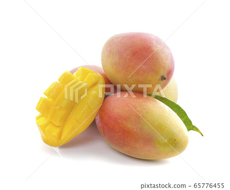 Mango fruit with mango cubes and slices an 65776455