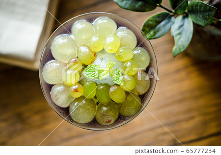 Grapes cocktail or lemonade. 65777234