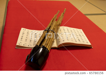 Gagaku sho and sheet music placed in a Japanese-style room with tatami flooring 65780156