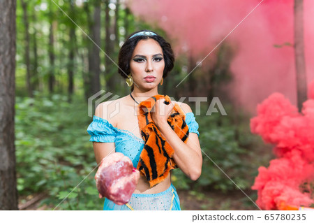 Woman calls stop wearing fur. Vegetarian campaign against the fur industry. Eco friendly behaviour. Protect the animals. 65780235