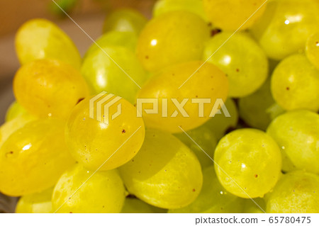 Close-up branch of raisins grapes close up 65780475