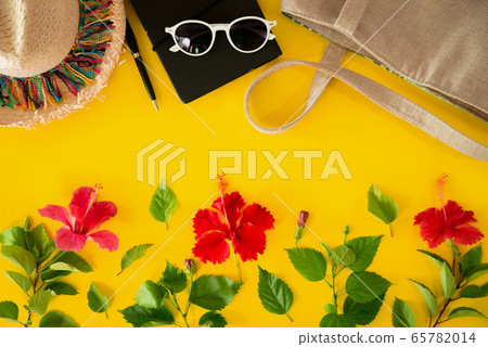 Beach accessories For the traveler on the yellow background - sunglasses, backpack. summer Beach accessories For the traveler on the yellow background - sunglasses, backpack. summer 65782014