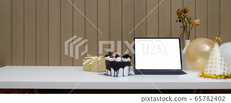 Online birthday party concept with mock-up tablet, Online birthday party concept with mock-up tablet, 65782402