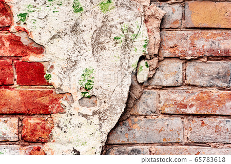 Texture of a brick wall with cracks and scratches Texture of a brick wall with cracks and scratches 65783618