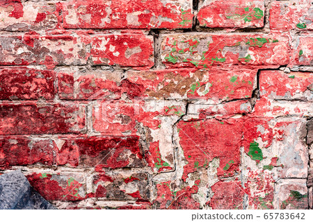 Texture of a brick wall with cracks and scratches 65783642
