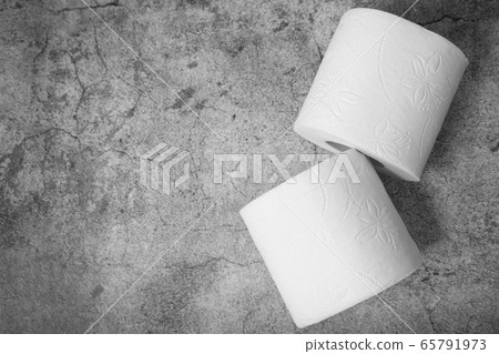 Top view of two rolls of toilet paper with Top view of two rolls of toilet paper with 65791973