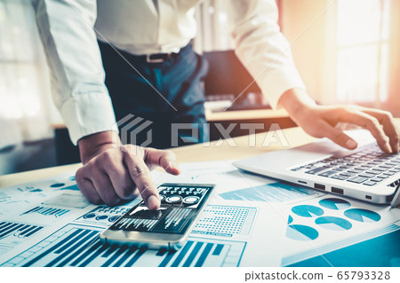 Businessman analyze data of stock market research. 65793328