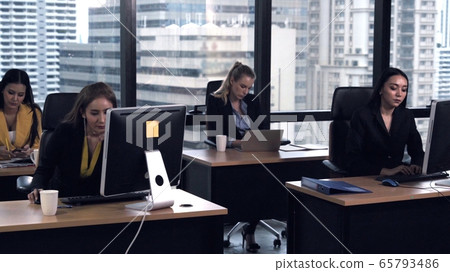 Business people working with desktop computer in office. Business people working with desktop computer in office. 65793486