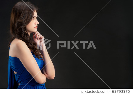 Beautiful woman fashion model in blue dress. Beautiful woman fashion model in blue dress. 65793570