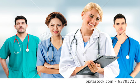 Doctor working in hospital with other doctors. 65793725