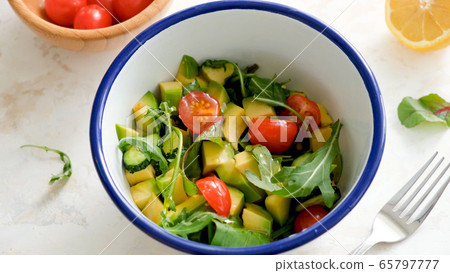 Salad with avocado, tomato, arugula 65797777